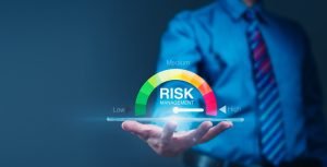 Businessman,Analyzes,Risk,Scale,On,Tablet.,Concept:,Financial,Management,Strategies