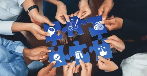 Collaboration a group of hands holding jigsaw pieces